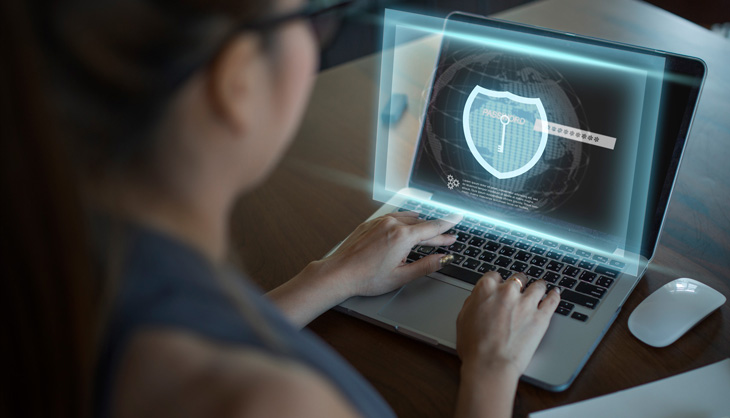 solutionIT managed security uses AnyDesk Woman in front of a screen with security icons